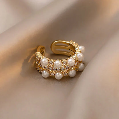 Regulowany pierścionek z podwójną perłą w kolorze złotym dla eleganckiego stylu