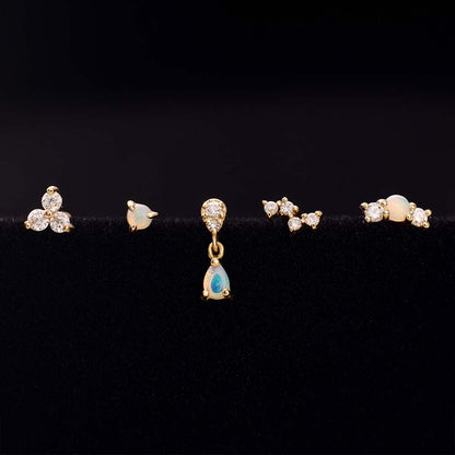 Opal i diamentowy piercing
