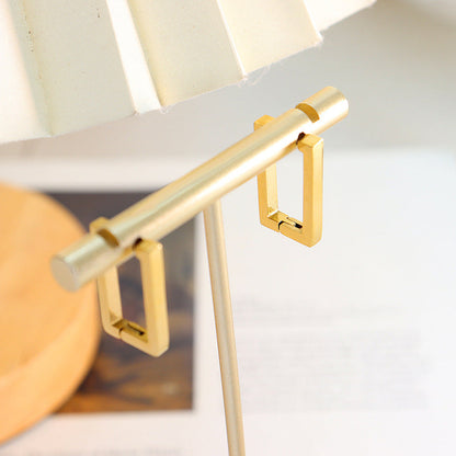 Złote geometryczne kolczyki Terra