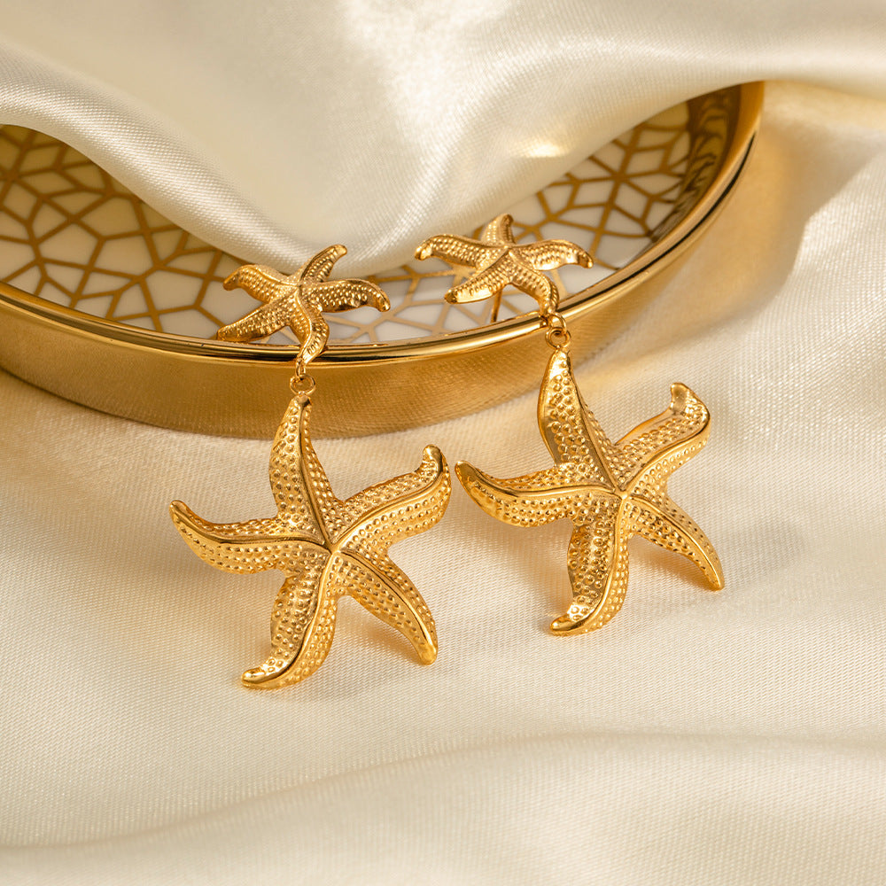 Kolczyki rozgwiazdy złote 18k eleganckie