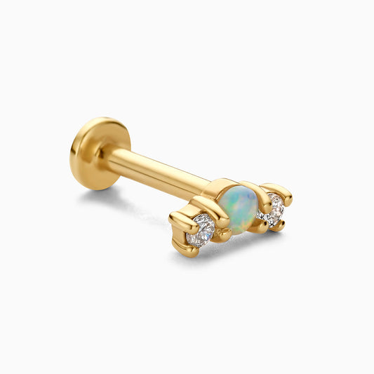 Opal i diamentowy piercing