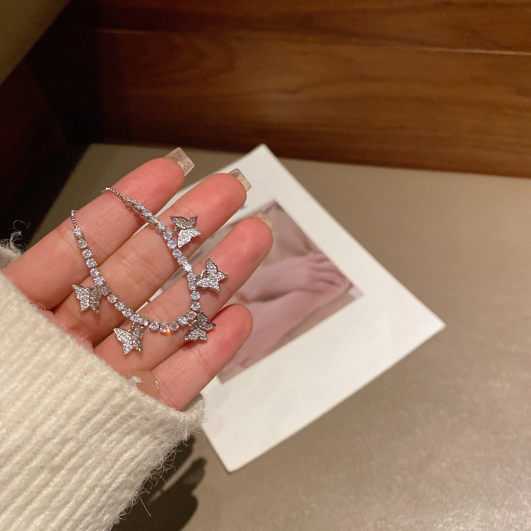 Bransoletka tenisowa z motylem Camelia